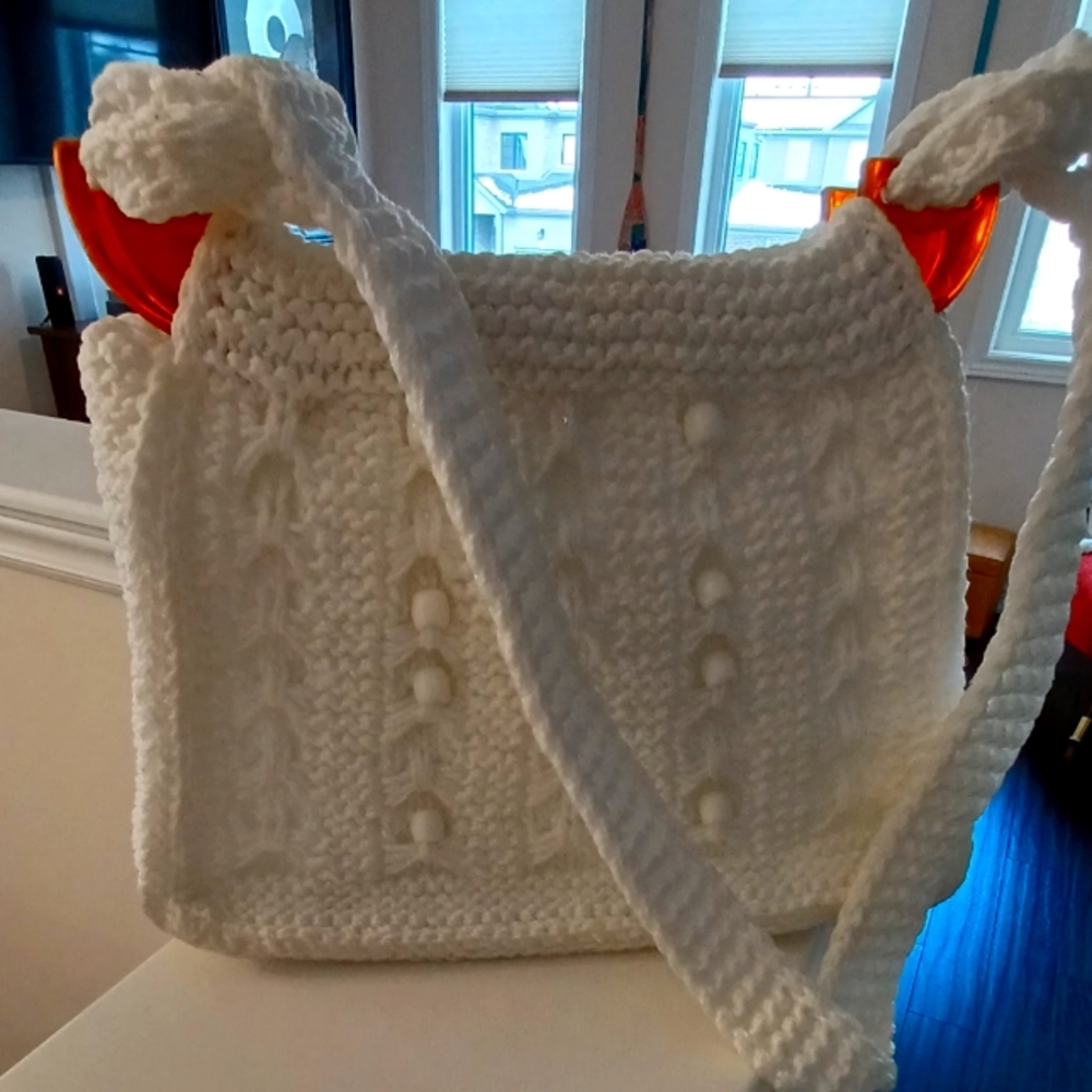 Absolutely amazing white crocheted purse.
